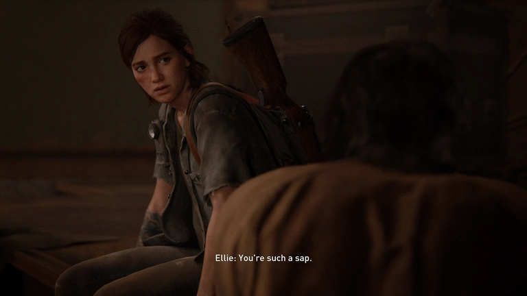 Ellie looks toward another character as the subtitle reads, You're such a sap